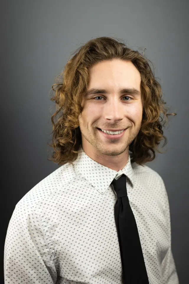 Jacob Brenner, Doctor of Physical Therapy, in a studio portrait